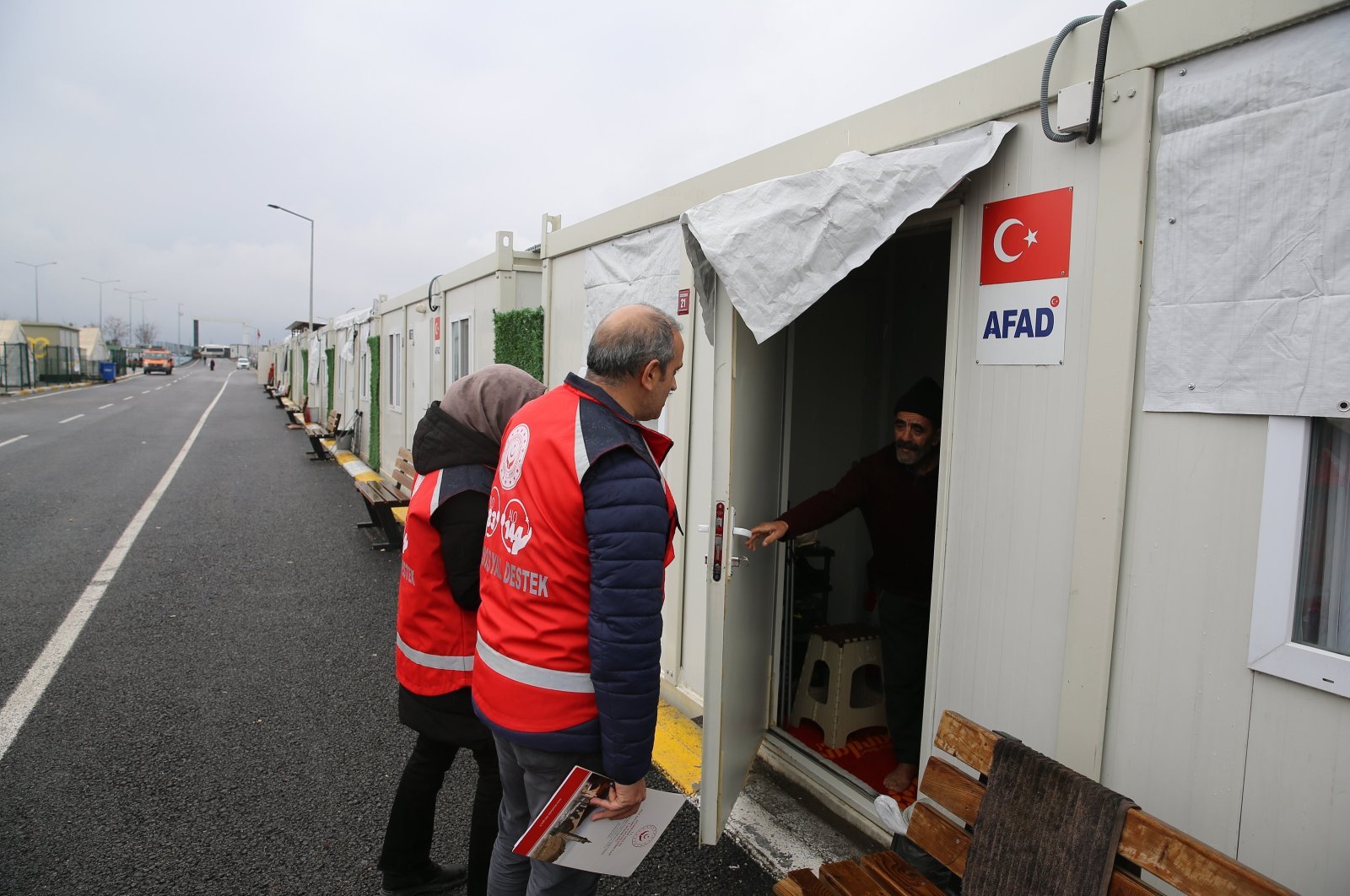 The Family and Social Services teams visit earthquake victims in their homes in the container city, 
Diyarbakır, Türkiye, Jan. 31, 2024. (AA Photo)