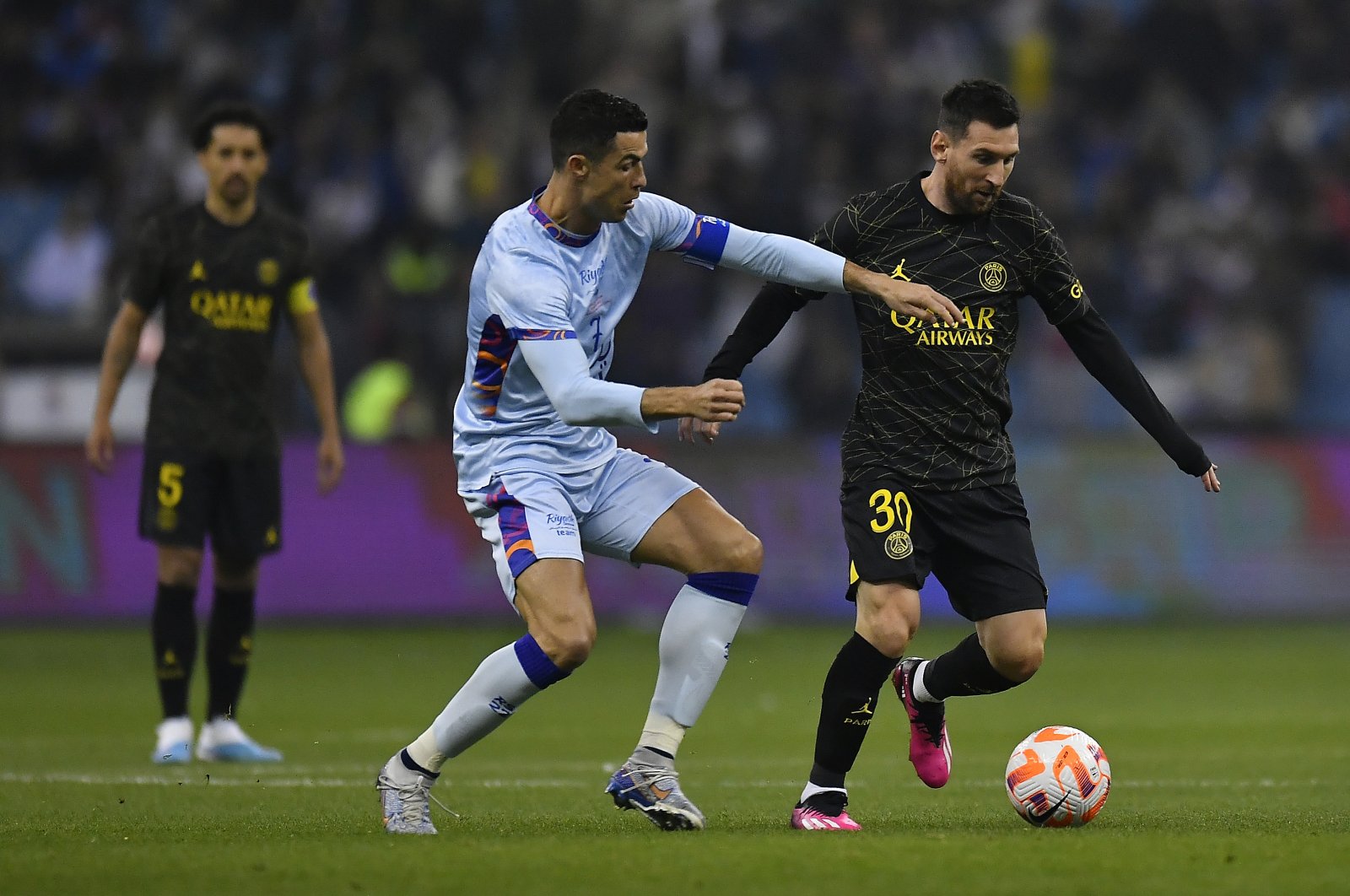 Ex-PSG star Lionel Messi (R) and Riyadh XI&#039;s Cristiano Ronaldo fight for possession during the friendly match at King Fahd International Stadium, Riyadh, Saudi Arabia, Jan. 19, 2023. (Getty Images Photo)