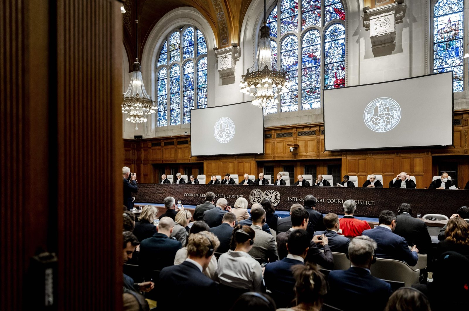 Judges led by ICJ President Joan Donoghue (C) attend a hearing at the International Court of Justice (ICJ) prior to the ruling in a lawsuit brought by Ukraine against Russia, in The Hague, on Jan. 31, 2024. (AFP Photo)