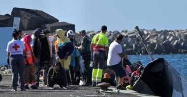 A group of 66 migrants onboard a wooden boat ('cayuco') arrive at La Restinga port in El Hierro island, the Canaries, Spain, Jan. 11, 2024. (EPA Photo)