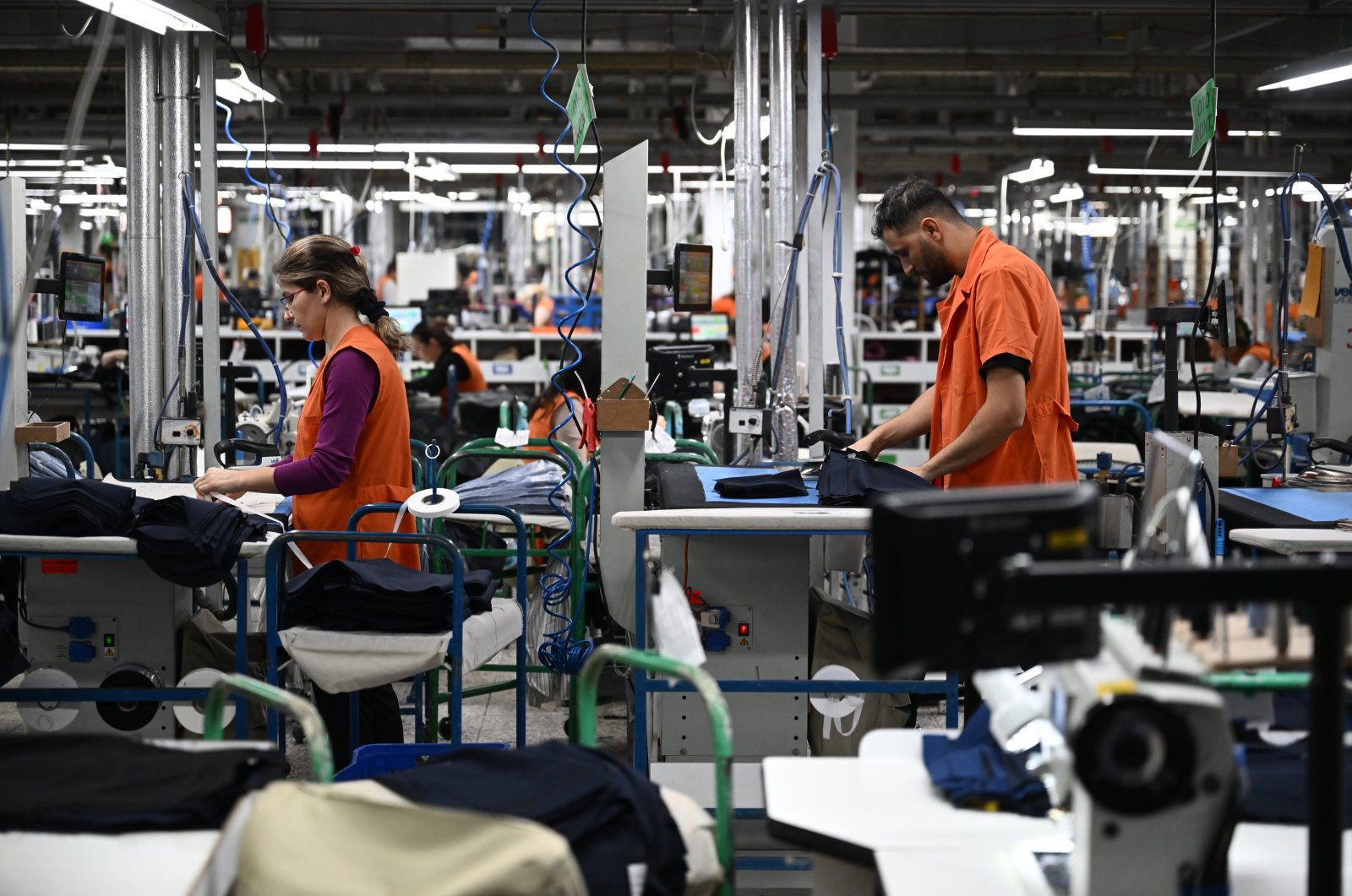 The workers are seen in a factory established in Edirne, which produces 65% of the electricity it consumes from a solar power plant, in northwestern Türkiye, Jan. 10, 2024. (AA Photo)