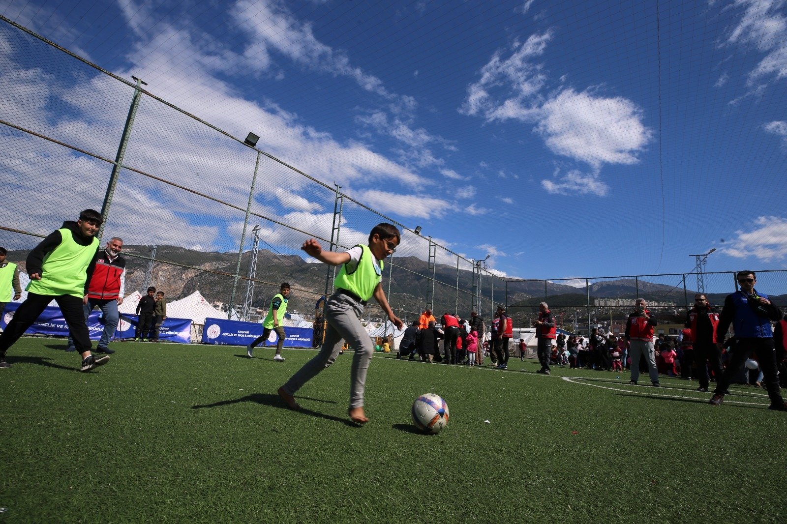 Children in the earthquake-affected zone play football amid the psychological relief initiatives by the Ministry of Youth and Sports, Kahramanmaraş, Türkiye, Feb. 1, 2024. (DHA Photo)