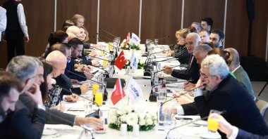 Nail Olpak (C-R), head of the Foreign Economic Relations Board (DEIK), speaks during a meeting with journalists, Istanbul, Türkiye, Jan. 31, 2024. (Courtesy of DEIK)