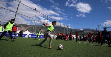 Children in the earthquake-affected zone play football amid the psychological relief initiatives by the Ministry of Youth and Sports, Kahramanmaraş, Türkiye, Feb. 1, 2024. (DHA Photo)
