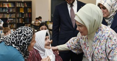 First Lady Emine Erdoğan speaks with an elderly woman at Vefahane senior's complex in Istanbul, Feb. 2, 2024. (AA Photo)