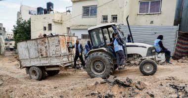 Members of UNRWA work, following an Israeli raid, in Jenin camp, in the Israeli-occupied West Bank Jan. 29, 2024. (Reuters Photo)