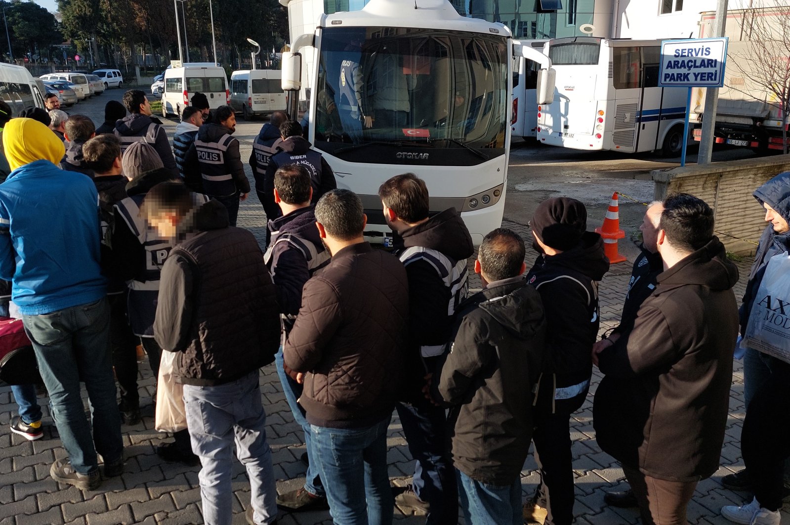 Suspects detained in Cage-34 operations are escorted to a courthouse, Balıkesir, Türkiye, Feb. 2, 2024. (IHA Photo)