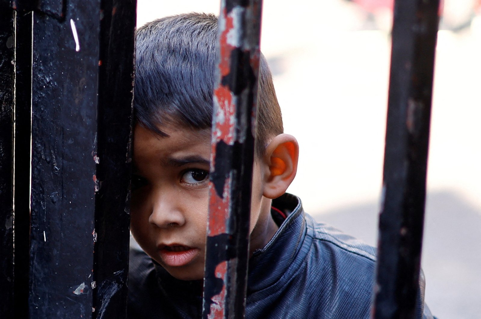 A displaced Palestinian child looks on while sheltering in a UNRWA school, amid the ongoing conflict between Israel and Hamas, Rafah, Palestine, Feb. 1, 2024. (Reuters Photo)