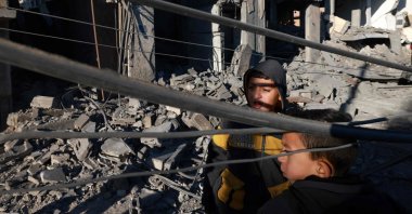 Children check the devastation in the aftermath of Israeli bombardment on Rafah, southern Gaza, Palestine, Feb. 4, 2024. (AFP Photo)
