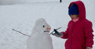 A child enjoys the last day of the semester break in Gölcük Nature Park, Bolu, Türkiye, Feb. 4, 2024. (AA Photo)