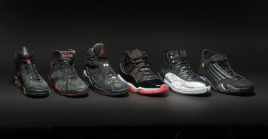A collection of sneakers dubbed the "Dynasty Collection" that superstar Michael Jordan wore as he and the Chicago Bulls won six NBA championships, Feb. 2, 2024. (AP Photo)