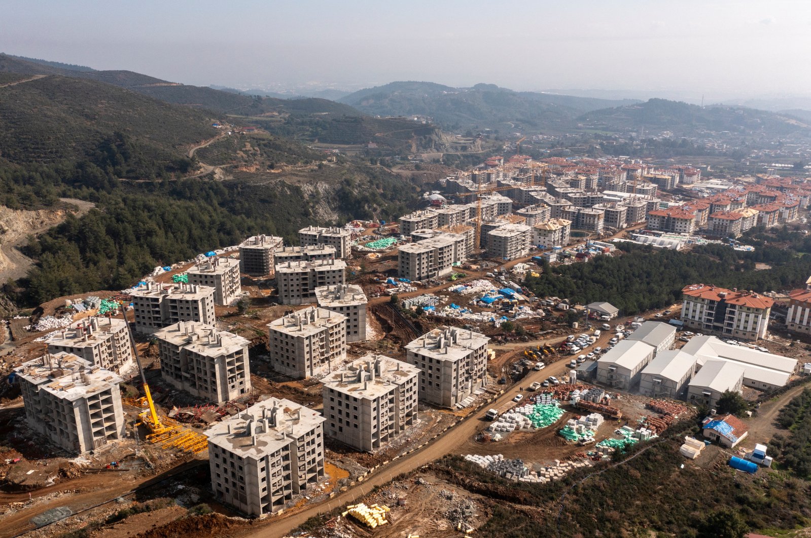An aerial view shows new residential buildings being constructed after last year&#039;s devastating earthquake in Hatay province, southern Türkiye, Feb. 2, 2024. (Reuters Photo)