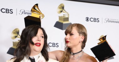 Taylor Swift celebrates with Lucy Dacus of boygenius during the 66th Annual Grammy Awards in Los Angeles, California, U.S., Feb. 4, 2024. (Reuters Photo)