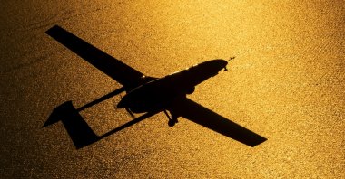 A Bayraktar TB2 combat drone flies over the Lake Van in eastern Türkiye, Aug. 7, 2023. (DHA Photo)