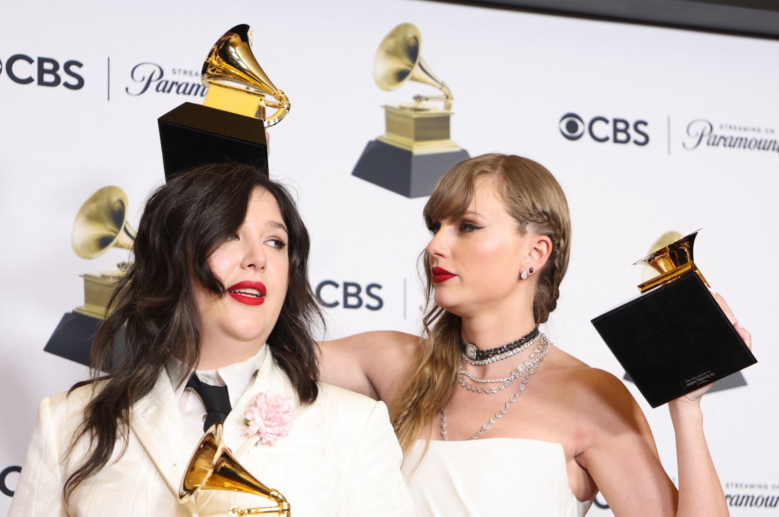 Taylor Swift celebrates with Lucy Dacus of boygenius during the 66th Annual Grammy Awards in Los Angeles, California, U.S., Feb. 4, 2024. (Reuters Photo)