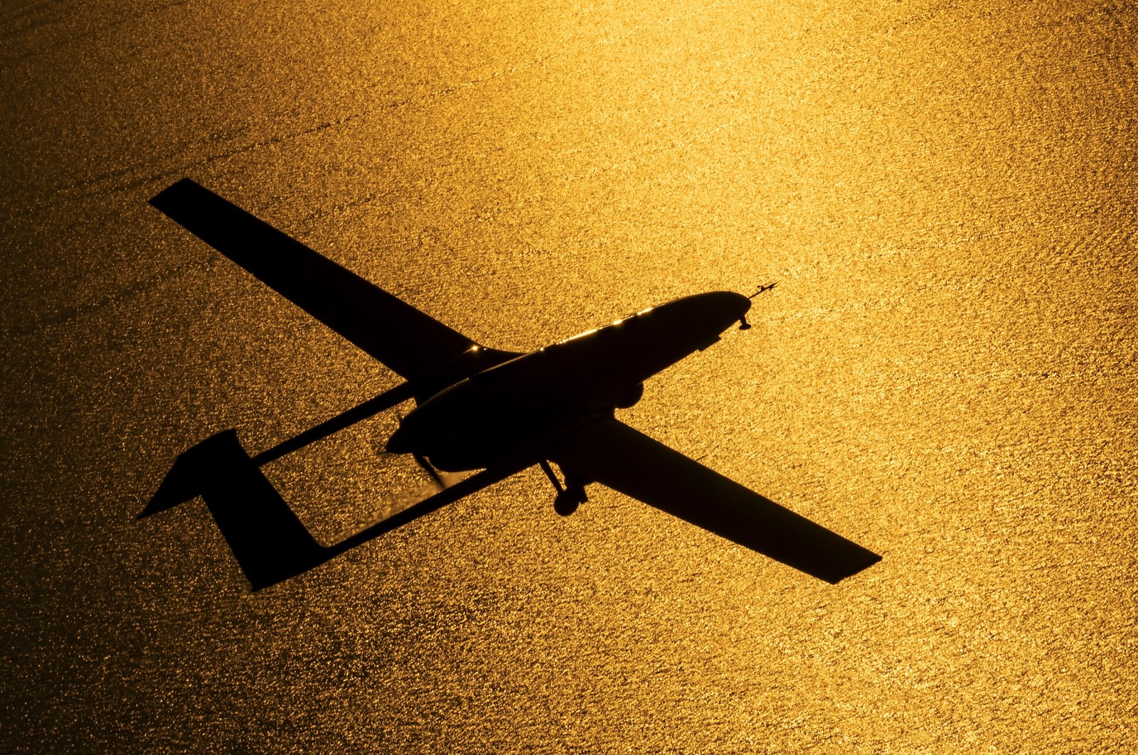 A Bayraktar TB2 combat drone flies over the Lake Van in eastern Türkiye, Aug. 7, 2023. (DHA Photo)