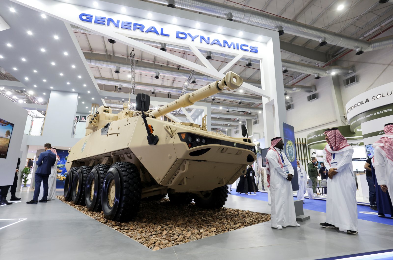 People are seen at General Dynamics stand displaying the latest defense system at the World Defense Show in Riyadh, Saudi Arabia, March 6, 2022. (Reuters Photo)