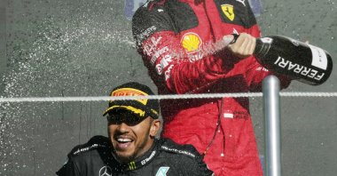 Mercedes driver Lewis Hamilton (C) and Ferrari driver Charles Leclerc of Monaco celebrate on the podium for the Formula One Mexico Grand Prix, Hermanos Rodriguez racetrack, Mexico City, Mexico, Oct. 29, 2023. (AP Photo)