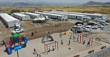 Children play in the park established in the container city, Kahramanmaraş, Türkiye, Feb. 6, 2024. (IHA Photo)