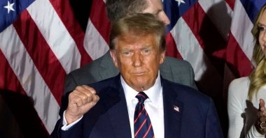 Republican presidential hopeful and former U.S. President Donald Trump gestures during an election night party in Nashua, New Hampshire, U.S., Jan. 23, 2024. (AFP Photo)