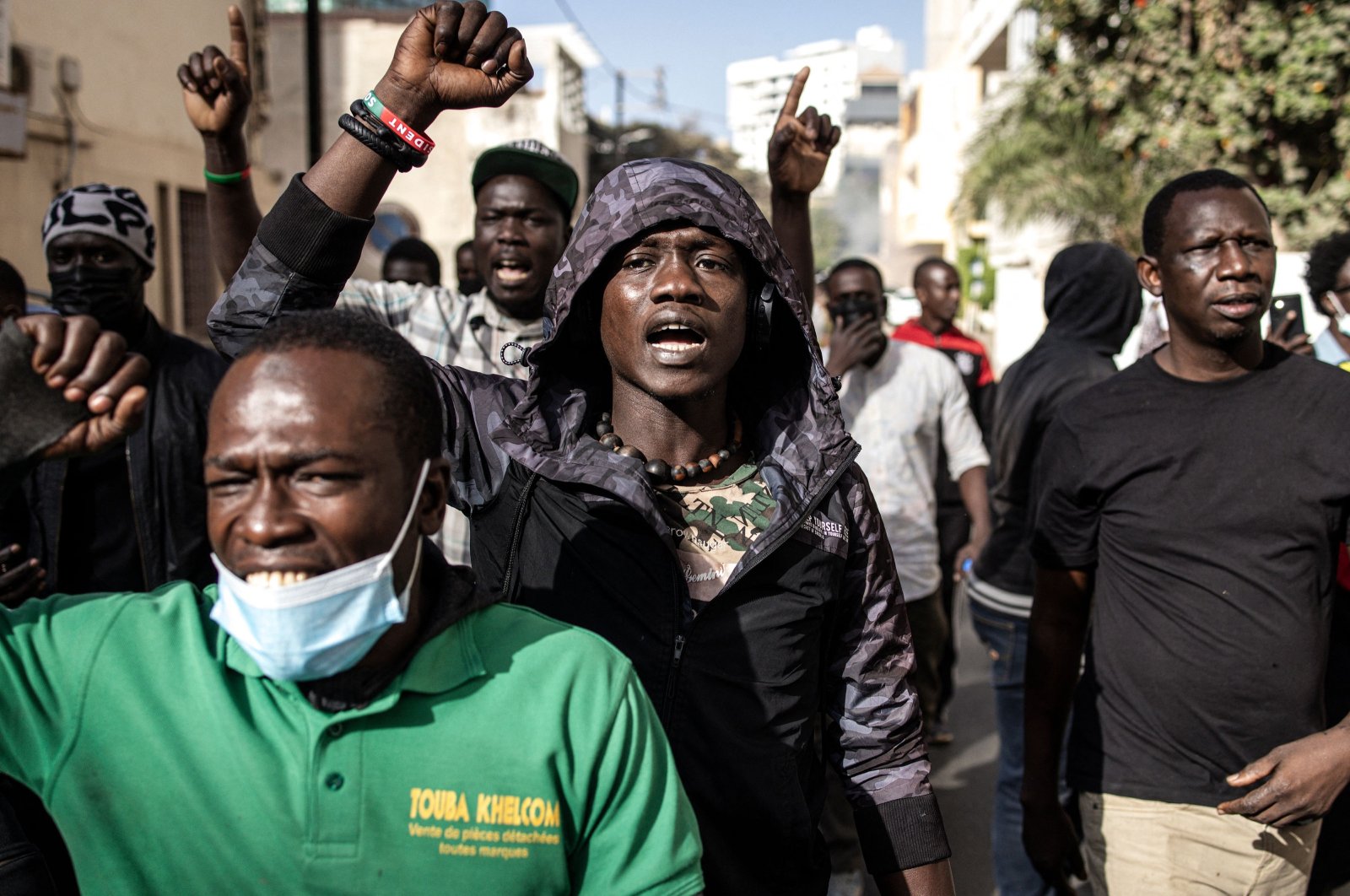 Protesters gesture after police fired teargas at them outside the General Assembly in Dakar, Senegal, Feb. 5, 2024. (AFP Photo)