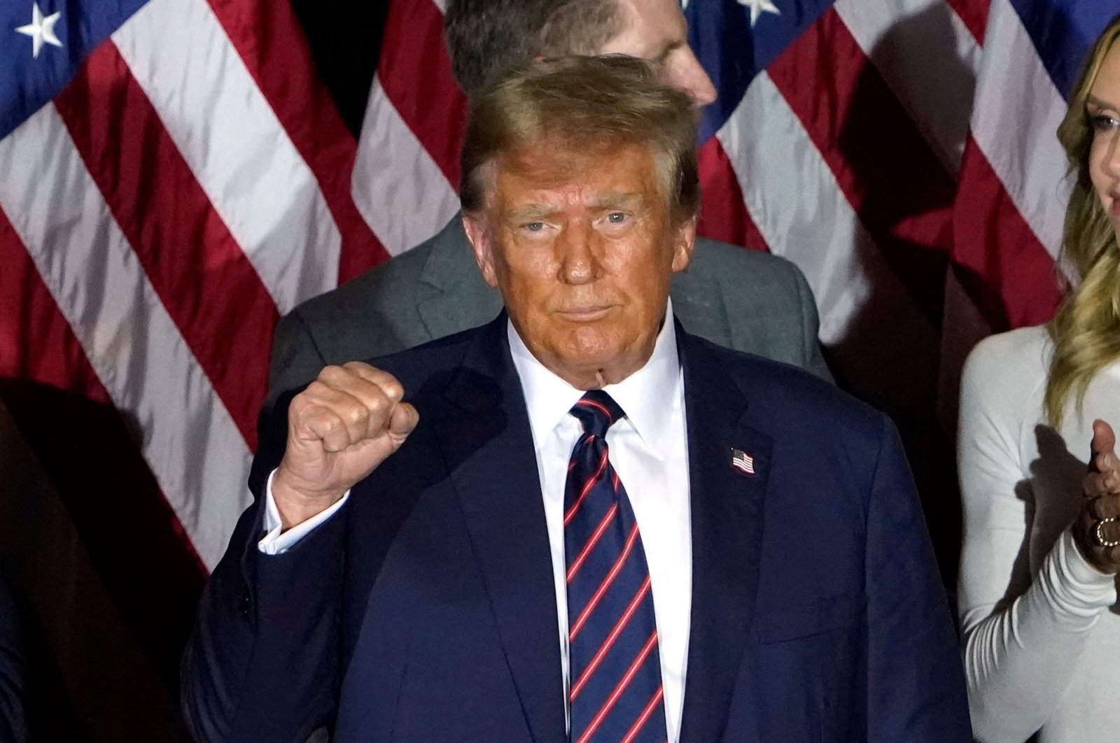 Republican presidential hopeful and former U.S. President Donald Trump gestures during an election night party in Nashua, New Hampshire, U.S., Jan. 23, 2024. (AFP Photo)