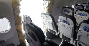 The fuselage plug area of Alaska Airlines Flight 1282 Boeing 737-9 MAX, which was forced to make an emergency landing with a hole in the fuselage, is seen during its investigation by the National Transportation Safety Board (NTSB) in Portland, Oregon, U.S., Jan. 7, 2024. (Reuters Photo)