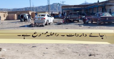 Pakistani security officials inspect the scene of a blast at an election campaign office in Pishin, Pakistan, Feb. 7 2024 (EPA Photo)