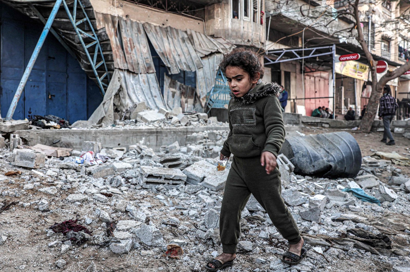 A girl walks through rubble in an area hit by Israeli bombardment, in Rafah, Gaza, Palestine, Feb. 7, 2024. (AFP Photo)