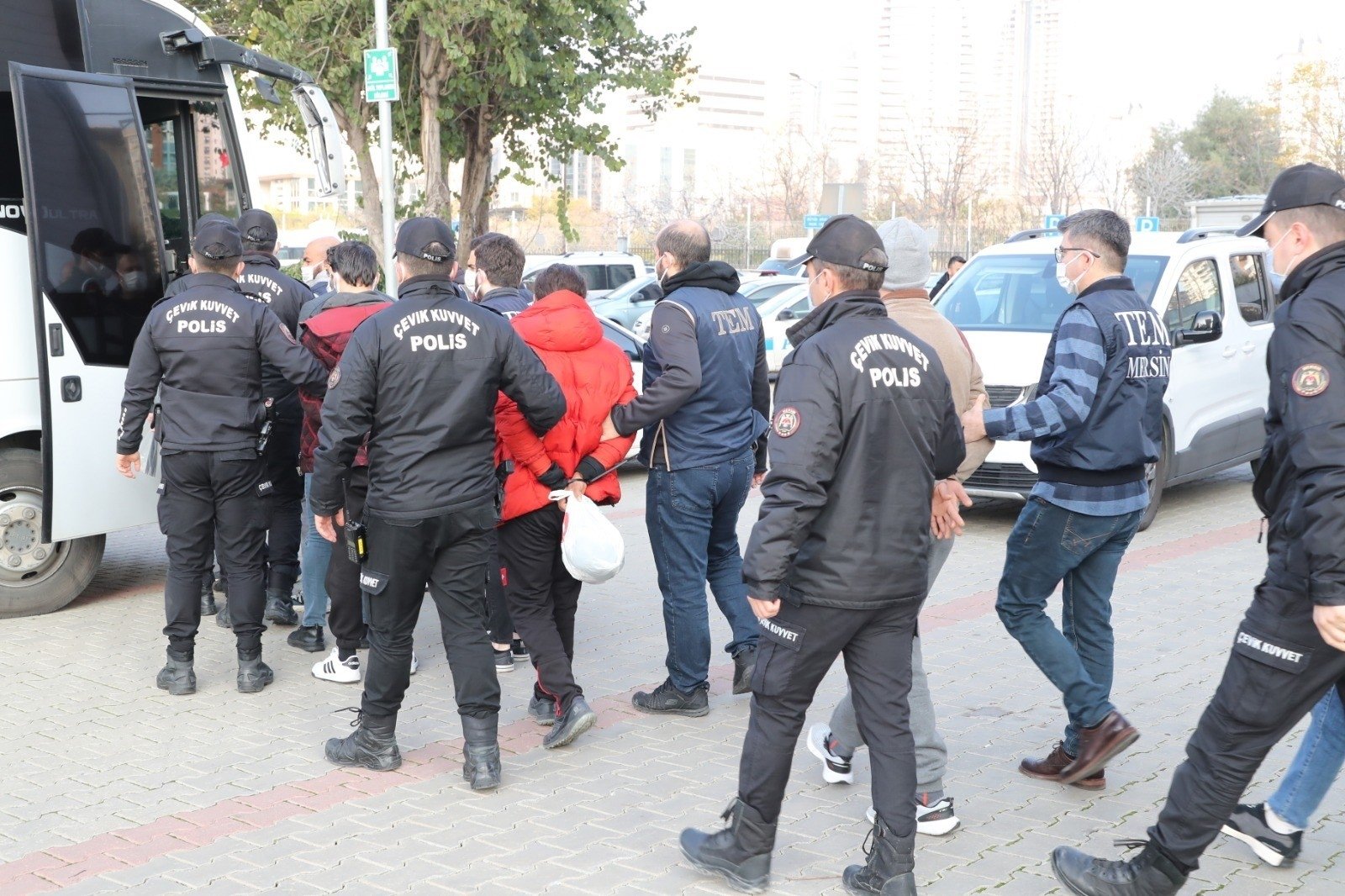 Police escort Daesh suspects captured in Mersin, southern Türkiye, Feb. 8, 2024. (İHA Photo)