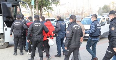 Police escort Daesh suspects captured in Mersin, southern Türkiye, Feb. 8, 2024. (İHA Photo)