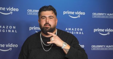 Musician Summer Cem arrives at the Zoo Palast for a photo session on the occasion of the Amazon series &quot;Celebrity Hunted,&quot; Berlin, Germany, Nov. 25, 2021. (Getty Images Photo)