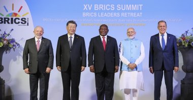 From L to R: Brazilian President Luiz Inacio Lula da Silva, Chinese President Xi Jinping, South African President Cyril Ramaphosa, Indian Prime Minister Narendra Modi and Russian Foreign Minister Sergey Lavrov pose for a photo on the sideline of the BRICS group of emerging economies three-day summit in Johannesburg, South Africa, Aug. 22, 2023. (AP Photo)