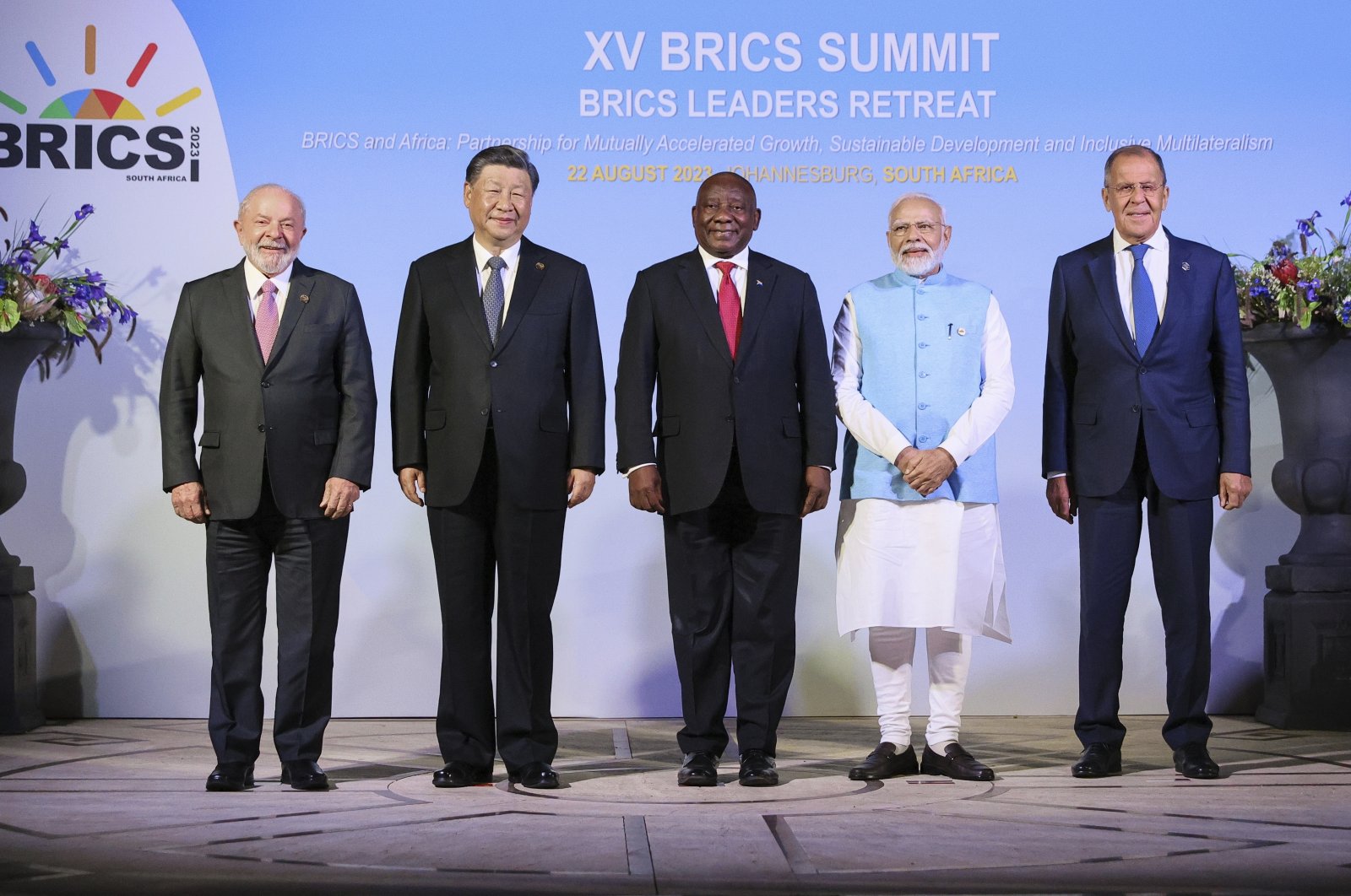 From L to R: Brazilian President Luiz Inacio Lula da Silva, Chinese President Xi Jinping, South African President Cyril Ramaphosa, Indian Prime Minister Narendra Modi and Russian Foreign Minister Sergey Lavrov pose for a photo on the sideline of the BRICS group of emerging economies three-day summit in Johannesburg, South Africa, Aug. 22, 2023. (AP Photo)
