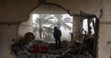 A Palestinian inspects a damaged building following an Israeli airstrike on the Rafah refugee camp, Gaza Strip, Palestine, Feb. 9, 2024. (EPA Photo)