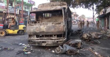 The remains of a charred vehicle are seen in Haldwani, Uttarakhand, India, Feb. 9, 2024. ()