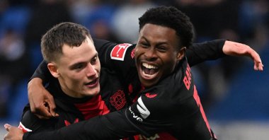 Bayer Leverkusen&#039;s Nathan Tella (R) celebrates a goal against Bayern Munich with teammate Florian Wirtz, Darmstadt, Germany, Feb. 3, 2024. (AFP Photo)