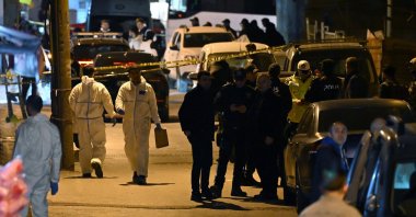 Police teams conduct an investigation after an armed attack at an election campaign in Istanbul's Küçükçekmece district, Türkiye, Feb. 10, 2024. (AA Photo)