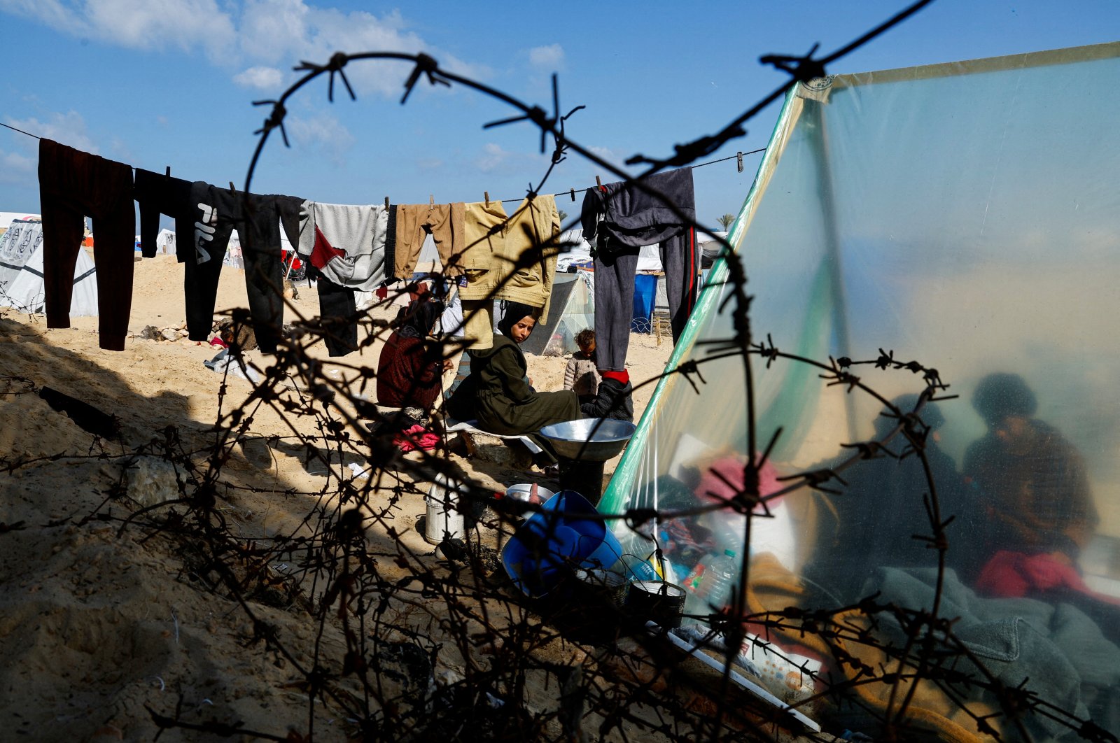 Internally displaced Palestinians take shelter near the border with Egypt, in Rafah, southern Gaza Strip, Palestine, Feb. 10, 2024. (Reuters Photo)
