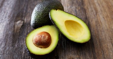 Avocados, rich in essential nutrients like healthy fats and vitamins, nourish your skin from within, promoting a radiant complexion. (Getty Images Photo) 