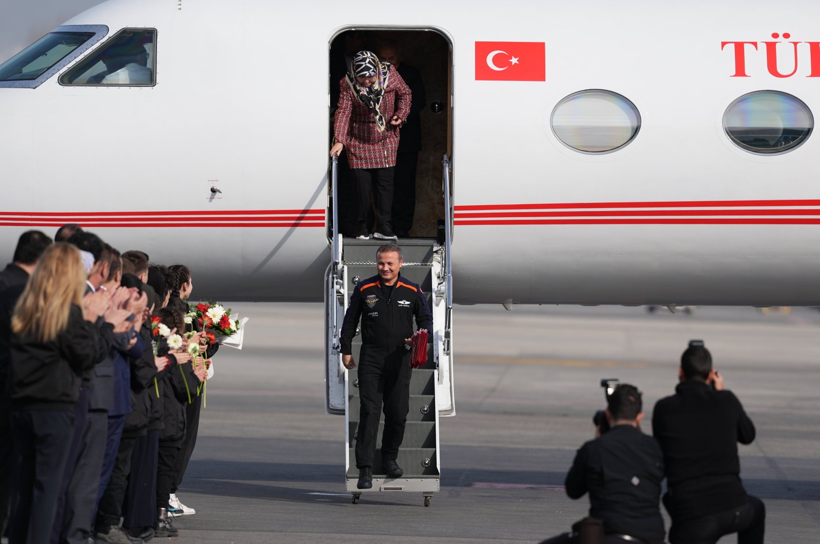 Alper Gezeravcı, Türkiye&#039;s first astronaut, exits a plane as he arrives in Ankara, Türkiye, Feb. 12, 2024. (AA Photo)