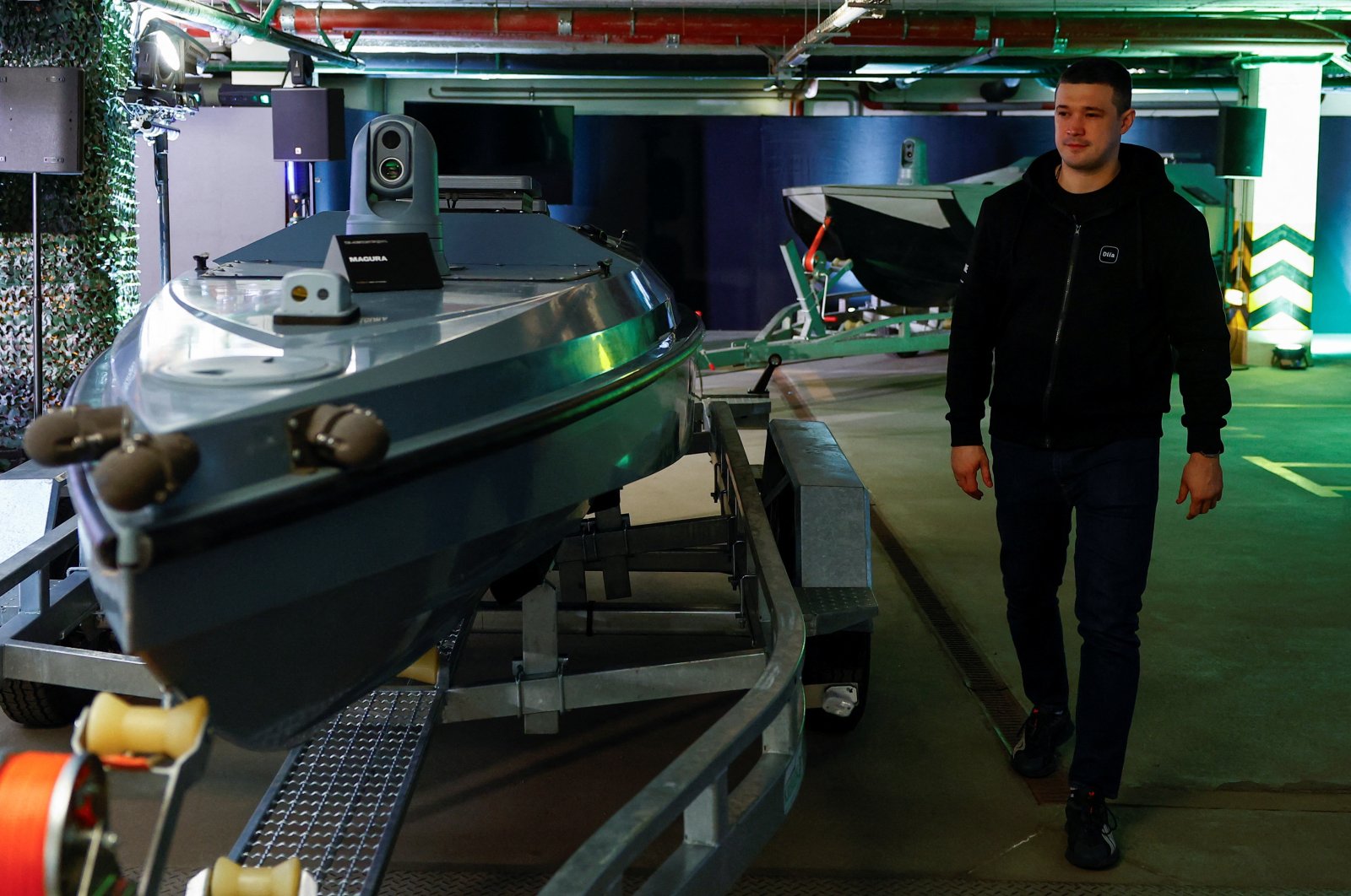 Mykhailo Fedorov, deputy prime minister and minister of Digital Transformation of Ukraine, walks next to Magura unmanned marine vehicles during an interview, amid Russia’s attack on Ukraine, Kyiv, Ukraine, Feb. 3, 2024. (Reuters Photo)