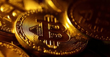 This illustration shows physical representations of the Bitcoin cryptocurrency, Oct. 24, 2023. (Reuters Photo)