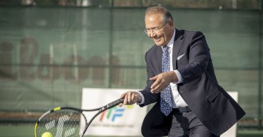 Turkish Tennis Federation (TTF) President Cengiz Durmuş hits a ball after an interview, Ankara, Türkiye, Feb. 8, 2024. (AA Photo)