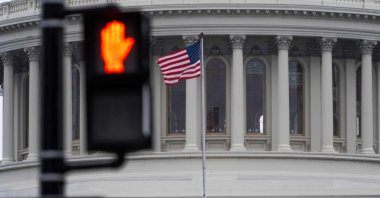 The U.S. flag flutters in the wind as the Senate works through the weekend on a $95.3 billion foreign aid bill with assistance for Ukraine and Israel at the Capitol, in Washington, DC, U.S., Feb. 11, 2024. (AFP Photo)
