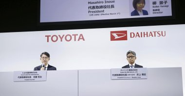 Toyota Chief Executive Koji Sato (L) and Masahiro Inoue (R), now overseeing Toyota’s business in South America, attend a press conference in Tokyo, Japan, Feb. 13, 2024.
