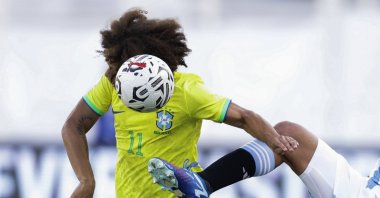 Argentina&#039;s Gonzalo Lujan (R) vies for the ball with Brazil&#039;s Guilherme Biro during a CONMEBOL U-23 Pre-Olympic qualifier match at the Brigido Iriarte Stadium, Caracas, Venezuela, Feb. 11, 2024. (EPA Photo)