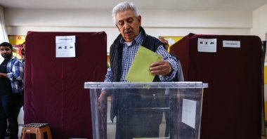 A man casts his ballot as he votes at a polling station in Ankara, Türkiye, May 28, 2023. (EPA Photo)