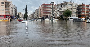 Cars sit in a flooded street caused by heavy rainfall in Antalya, southern Türkiye, Feb. 13, 2024. (AA Photo)