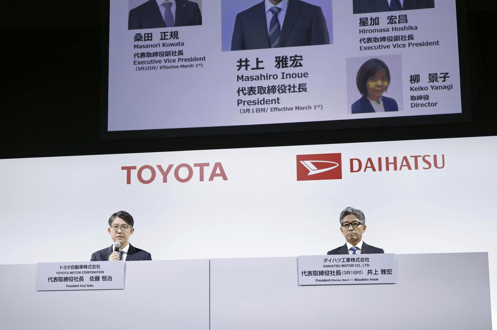 Toyota Chief Executive Koji Sato (L) and Masahiro Inoue (R), now overseeing Toyota’s business in South America, attend a press conference in Tokyo, Japan, Feb. 13, 2024.